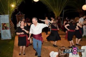 Χορευτής με εικόνα Αγίου στο βάθος, Μεσσηνιακή Βραδιά 2017